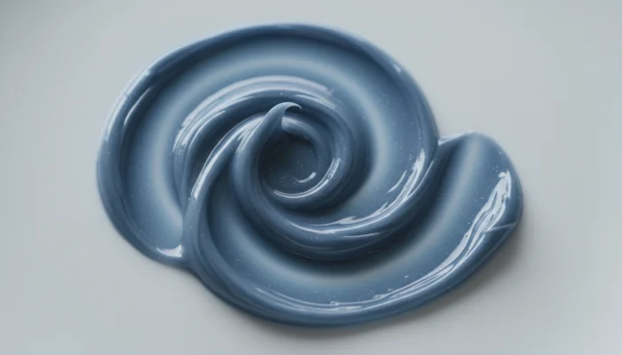 Close-up of Augustinus Bader cream texture, velvety and rich, laboratory aesthetic